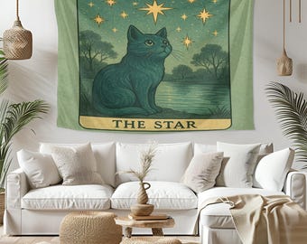 以下が含まれることがあります： 星を見上げる黒い猫が描かれた緑色のタペストリー。タペストリーの下部には「The Star」という文字が書かれています。