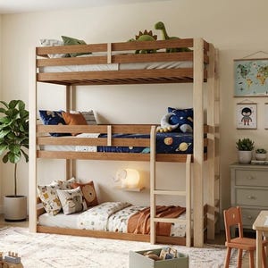 May include: A triple bunk bed constructed from light-toned wood with horizontal slats on each level. The bed features three stacked sleeping tiers, each equipped with a mattress, pillows, and blankets. A vertical ladder is attached to the side.