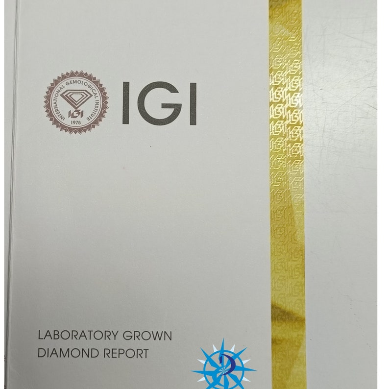 May include: A white document with the text "IGI LABORATORY GROWN DIAMOND REPORT" and a gold seal with the text "INTERNATIONAL GEMOLOGICAL INSTITUTE 1975".