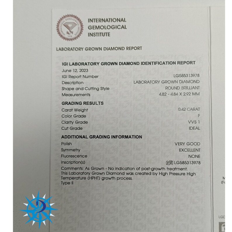 May include: A laboratory grown diamond report from the International Gemological Institute (IGI) for a 0.42 carat, round brilliant diamond. The diamond is graded as F in color, VVS1 in clarity, and Ideal in cut. The report includes additional grading information, such as very good polish, excellent symmetry, and no fluorescence.