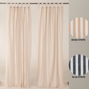 May include: Two beige and white striped curtains with a beige and white striped fabric swatch labeled "Beige Stripe" and a blue and white striped fabric swatch labeled "Blue Stripe".