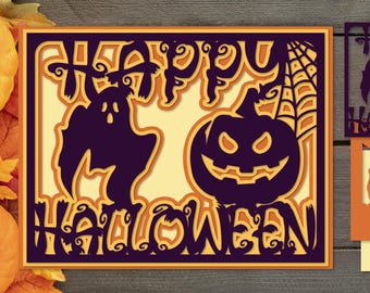 May include: A 3D layered papercraft card with a Halloween theme. The card features a ghost, a pumpkin, and the words "Happy Halloween" in a layered design.
