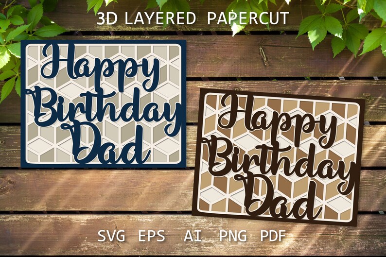 May include: Two layered papercut cards with a honeycomb pattern. The cards say "Happy Birthday Dad" in a decorative font. One card is blue and the other is brown.
