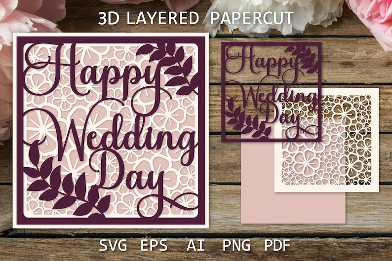 以下が含まれることがあります： 「Happy Wedding Day」という文字が、ワインレッドで書かれた、3Dレイヤーペーパーカットデザイン。花柄と葉っぱのデザインが施されています。このペーパーカットは、結婚式カードや招待状に組み立てることができます。