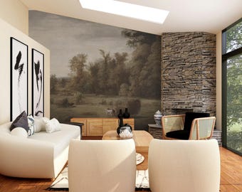 May include: A modern living room with a large landscape mural, a white sofa with decorative pillows, and two cream-colored armchairs. A stone fireplace and a large window offer natural light. The room features wooden furniture and black and white artwork.