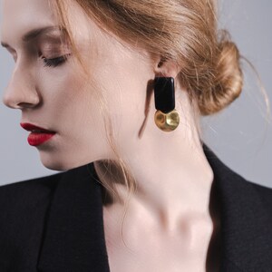 Statement black gold earrings
Stylish earrings
Daily earrings
elegant large earrings