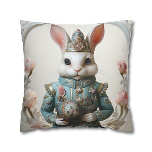 May include: A white rabbit wearing a blue and gold ornate costume holds a decorative egg. The rabbit is wearing a crown and has a white background with pink flowers.