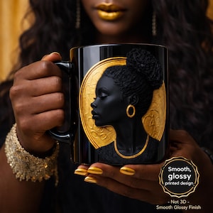 May include: Black ceramic mug featuring a gold-colored relief of a woman's profile against a gold circular background. The mug has a smooth, glossy finish and the text "Smooth, glossy printed design" is visible.