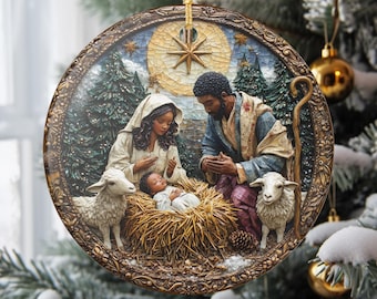May include: A round Christmas ornament featuring a Nativity scene. The ornament depicts Mary, Joseph, and baby Jesus in a manger, surrounded by sheep and a starry night sky. The ornament is trimmed with a gold-colored border and a gold string for hanging.