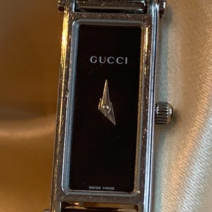 Vintage 90s/00s Gucci St. Steel 1500L Black Dial Rectangular Tank Style Dial Swiss Quartz Dainty Ladies Horsebit Bangle Wristwatch