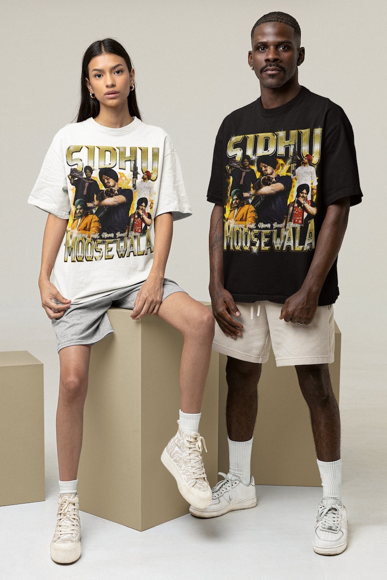 May include: Two people wearing black and white t-shirts with a graphic print of a group of people and the text "Sidhu Moosewala". The people in the image are wearing white and beige shorts and white sneakers.