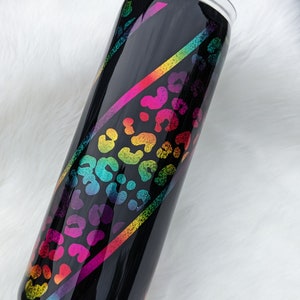 Rainbow Holographic Leopard Print on Black 20 oz. Skinny Stainless Tumbler.