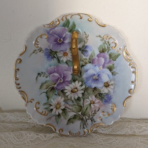 Vintage ceramic hand painted plate with handle