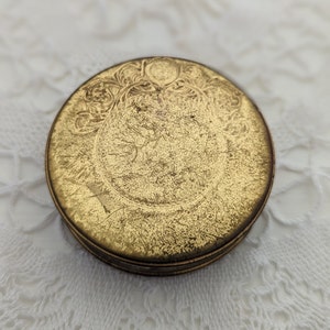 Vintage small gold compact