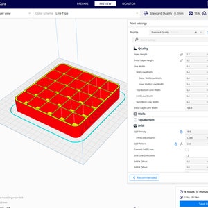May include: A 3D model of a red plastic organizer with 16 compartments. The model is shown in a 3D printing software program with settings for layer height, wall thickness, infill density, and other parameters. The software interface shows a print time of 9 hours and 24 minutes.