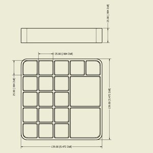 May include: Technical drawing of a rectangular tray with multiple square and rectangular compartments. The tray is 139 mm (5.472 inches) long and 25 mm (0.984 inches) high. The drawing includes dimensions in inches and the German unit "Zoll".