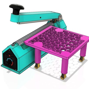 May include: A teal and black heat sealer with a pink honeycomb-patterned platform. The platform has four adjustable legs.