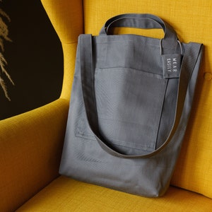 Grey cotton tote with dual pockets, top short handles, long body strap, and unique lavender sachet tag image 1