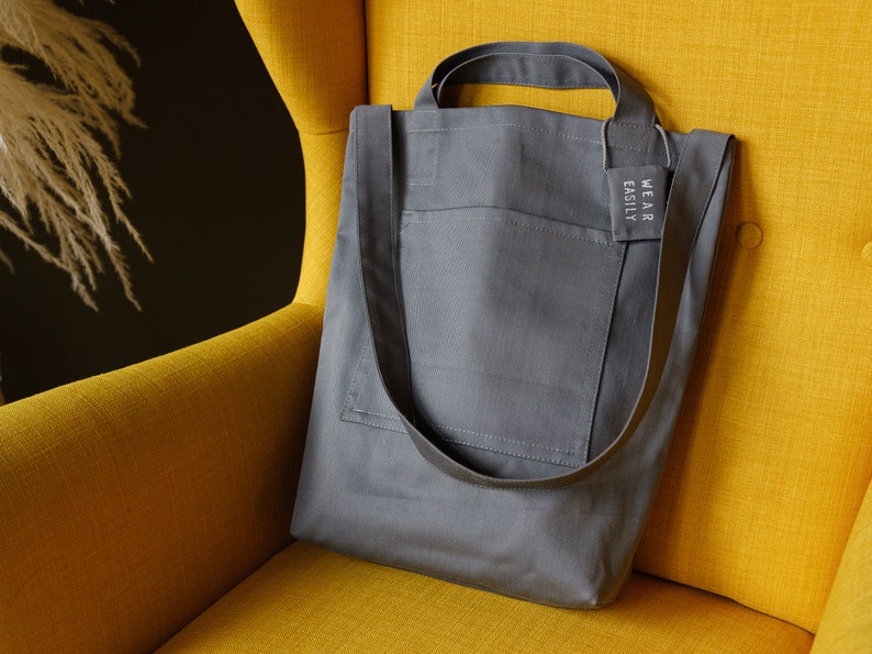 Grey cotton tote with dual pockets, top short handles, long body strap, and unique lavender sachet tag image 1