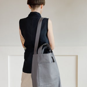 Grey cotton tote with dual pockets, top short handles, long body strap, and unique lavender sachet tag image 6