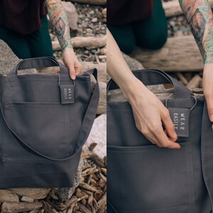 Grey cotton tote with dual pockets, top short handles, long body strap, and unique lavender sachet tag image 3