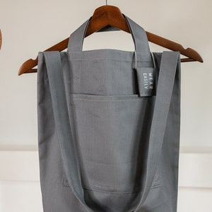 Grey cotton tote with dual pockets, top short handles, long body strap, and unique lavender sachet tag image 8