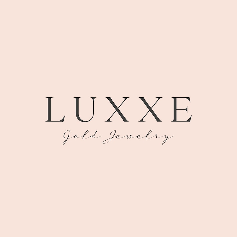 May include: A logo for a jewelry company called "Luxxe Gold Jewelry". The logo is in a minimalist style with the word "Luxxe" in all caps and the words "Gold Jewelry" in a cursive font.