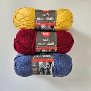 Red Heart Soft Essentials Yarn, Egg plant and Sunny Day, 100% Acrylic, 5 oz Skein. DUTY included in shipping.