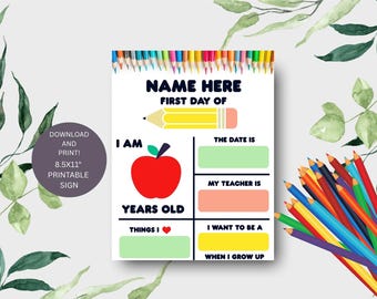 May include: A printable sign for the first day of school, featuring a red apple, a yellow pencil, and space to write in details. The sign is 8.5x11 inches and includes prompts for the date, teacher, and aspirations.