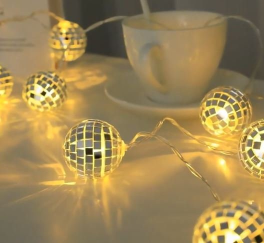 Hanging disco ball top with led lights