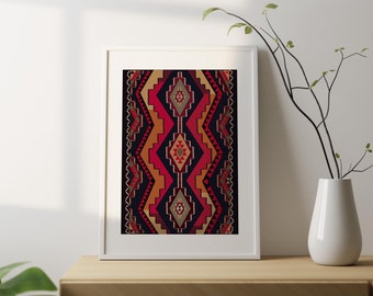May include: A framed print of a colorful geometric pattern in shades of red, orange, black, and white. The pattern is reminiscent of traditional rug designs.