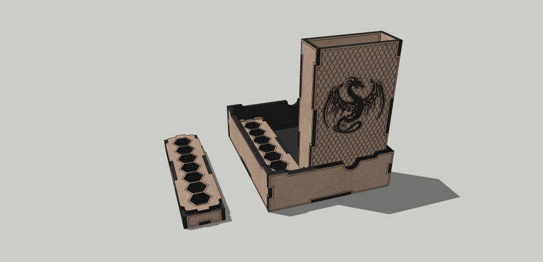 May include: A wooden dice tower with a dragon design on the front. The tower has a removable tray with compartments for dice. There is also a separate tray with compartments for dice.