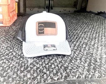 NC Flag Richardson Trucker Hat: Engraved Leather Patch