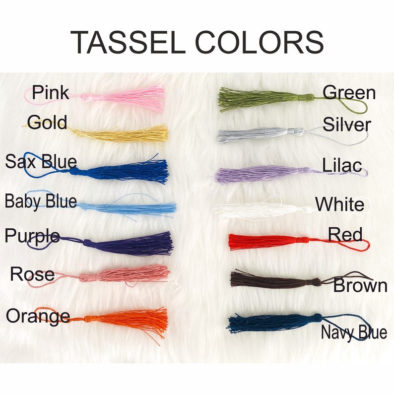 May include: A chart showing 16 different tassel colors, including pink, gold, sax blue, baby blue, purple, rose, orange, green, silver, lilac, white, red, brown, and navy blue.