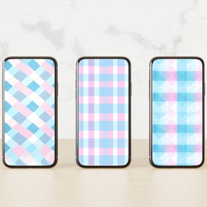 May include: Three smartphones displayed side-by-side, each featuring a distinct digital wallpaper. The left screen shows a diagonal plaid pattern, the center screen displays a vertical and horizontal grid, and the right screen features a geometric diamond design.