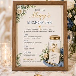 May include: A wooden framed sign with the text "Mary's Memory Jar" and instructions for sharing memories. A glass jar with the number "60" on it is surrounded by flowers. A gold pen and cards are on the table.