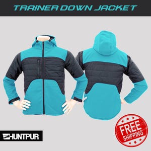 May include: A blue and black down jacket with a hood. The jacket has a zipper closure and a contrasting color design. The text "TRAINER DOWN JACKET" is at the top of the image. The text "FREE SHIPPING" is in a red circle at the bottom of the image.