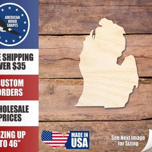 May include: A wooden cutout of the state of Michigan on a woodgrain background. The cutout is unpainted and has a natural wood color. The image also includes text that says "Free Shipping Over $35", "Custom Orders", "Wholesale Prices", "Sizing Up To 46"