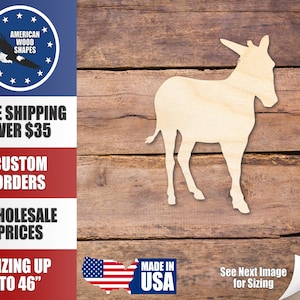 May include: A wooden cutout of a donkey, standing on a woodgrain background. The cutout is unpainted and ready to be decorated. The image also includes text that says "Free Shipping Over $35", "Custom Orders", "Wholesale Prices", "Sizing Up To 46"
