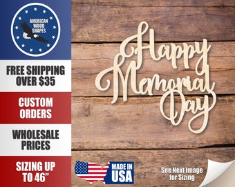 May include: Wooden cutout of the words "Happy Memorial Day" in a cursive font. The cutout is on a woodgrain background. The image also includes a small American flag and text that says "Made in USA".