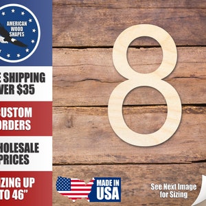 Könnte beinhalten: Ein ausgeschnittenes Holzzeichen der Zahl Acht, weiß lackiert, auf einem braunen Holzgrund. Die Zahl ist etwa 30 cm hoch. Das Bild enthält auch Text, der "Made in USA" und "Siehe nächstes Bild für die Größenangabe" lautet.