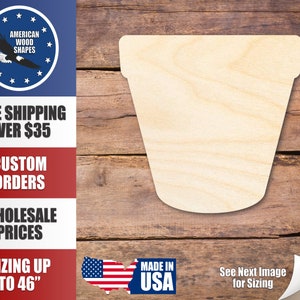 May include: A plain, unfinished wooden planter shape, perfect for crafting and DIY projects.  The planter is shown on a wood background.  Made in the USA.