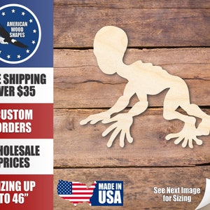 May include: Wooden cutout of a crouching alien creature with large head and long arms and legs. The cutout is made of unfinished wood and is ready to be painted or stained.  The cutout is available in sizes up to 46 inches.