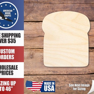 May include: A wooden bread slice shape, ready for crafting. The image includes the text "AMERICAN WOOD SHAPES", "CUSTOM ORDERS", "WHOLESALE PRICES", and "SIZING UP TO 46". The shape is made in the USA.