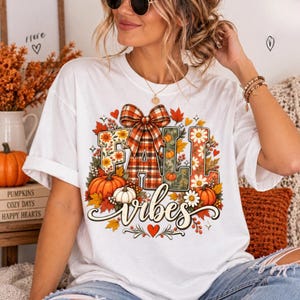 Höstvibbar Patchwork Pumpa Coquette Rosett T-shirt, Söt Höstälskare Gåva, Vintage Thanksgiving Pumpa Grafisk T-shirt