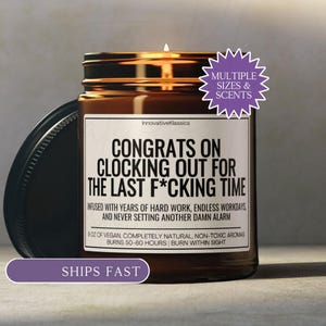 May include: A lit brown glass jar candle with a black lid. The label reads "CONGRATS ON CLOCKING OUT FOR THE LAST F*CKING TIME." The candle is infused with vegan, natural, non-toxic aromas and burns for 50-60 hours. The image also includes a "MULTIPLE SIZES & SCENTS" sticker.