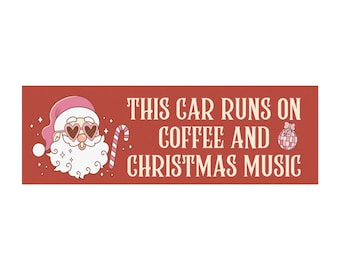 May include: Red and white car sticker with a cartoon Santa Claus wearing pink sunglasses and holding a candy cane. The text reads "This car runs on coffee and Christmas music".