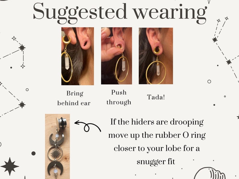 May include: A close-up of a gold hoop earring with a clear crystal pendant. The earring is shown being worn in a stretched earlobe. The image shows how to wear the earring, with instructions to bring the earring behind the ear and then push it through the earlobe.