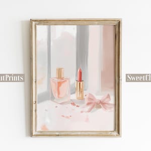 Puede incluir: Una ilustración enmarcada de un frasco de perfume rosa y un lápiz labial rojo con un lazo rosa sobre una superficie blanca.