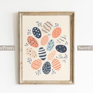 May include: A printable art print featuring a cluster of colorful Easter eggs with various patterns and designs. The eggs are arranged in a circular shape with a light background.